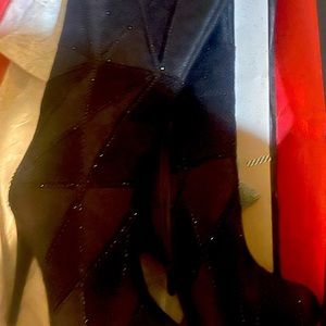 Black sparkling heel boots